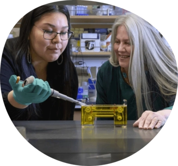 Doctoral student Angel-Grace Charity Leslie and Dr. Roberta Brinton